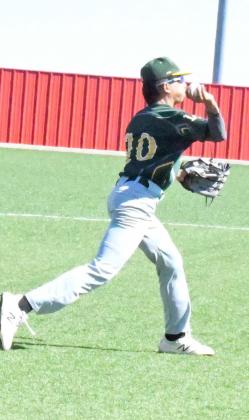 OUT AT FIRST – Springlake-Earth freshman third baseman, Gavin Gonzales, fields a ball and fires to first for the out, during game one of the Wolverines’ three game series with the Borden County Coyotes on Thursday at Hermleigh. (Staff Photo by Derek Lopez)