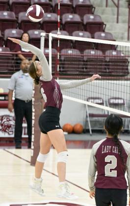 Littlefield JV1’s, Kealee Bussey, sends a hit over the net, during the first set of their 1-2 loss to Tulia on Tuesday at Wildcat Gym. (Staff Photo by Derek Lopez)