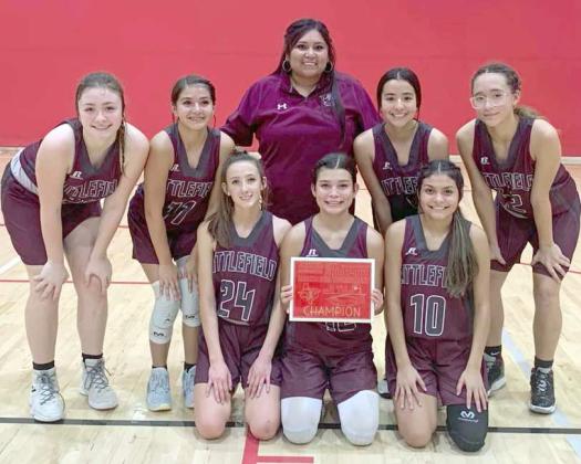DENVER CITY JV TOURNAMENT CHAMPIONS – The Littlefield JV1 Lady Cats’ basketball team went undefeated en route to winning the Denver City JV Girl’s Tournament Championship on Saturday. The Lady Cats defeated Abernathy, 28-21; Brownfield, 3420; Sands, 32-12; Wink, 52-12, and the host team Denver City, 56-35, to claim the Championship. Shown: Lyric Rios, Brianna Martinez, Chloe Sawyer, Coach Emily Castillo Rodriguez, Cali Saldana, Iris Hernandez, Monica Elizondo and Myli Hernandez. (Submitted Photo)