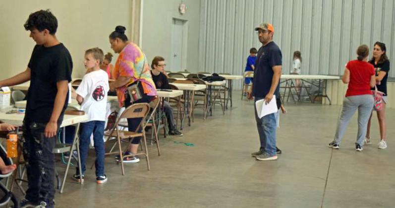 The Litttlefield Martial Arts Academy held sign-ups on Thursday, July 14, 2023. The class participants were assigned to classes according to age, measured for uniforms and received their Martial Arts Academy T-shirts. Due to flooding in the storage building the floor mats were damaged beyond restoration. They are seeking donations to replace the necessary equipment. (Photo by Ann Reagan)
