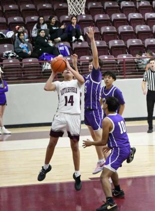 Littlefield’s Ben Castillo goes up for a lay-up, during the first half of their contest against Dimmitt on Tuesday at Wildcat Gym. (Staff Photo by Derek Lopez)