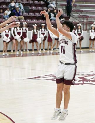 Littlefield’s Jose Payan fires up a three from the left elbow, during the first half of their contest against Dimmitt on Tuesday at Wildcat Gym. (Staff Photo by Derek Lopez)