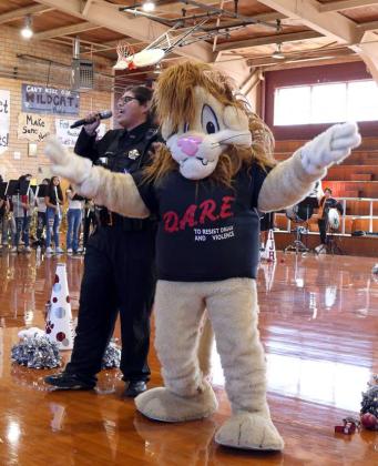 Officer Robles with the Lamb County Sheriff’s Office and the DARE Lion were on hand to educate students of Littlefield Elementary and the Littlefield Jr. High School on the dangers of illegal Drug Abuse during the DARE Pep Rally at the Littlefield Jr. High Gym on Wednesday, October 25, 2023. (Photo by Ann Reagan)