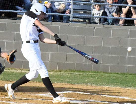 GETTING ON BASE - Sudan three-hole hitter, Caleb Groetken, singles off of the glvoe of Xavyer Mosqueda on the mound to give the Sudan Hornets a base runner in the bottom of the first inning of their homeopener against Springlake-Earth on Monday. (Staff Photo by Derek Lopez)
