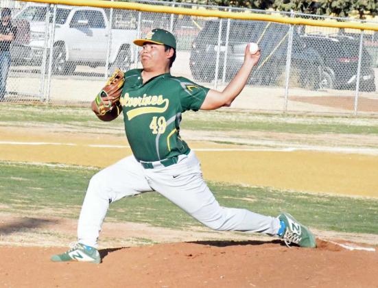 THROWING STRIKES - Springlake-Earth’s Xavyer Mosqueda deliveres a pitch in the bottom of the first inning of the Wolverines’ loss to Sudan on Monday on the road. Mosqueda pitched three innings, giving up seven runs and six walks, while earning seven strikeouts in the contest. (Staff Photo by Derek Lopez)