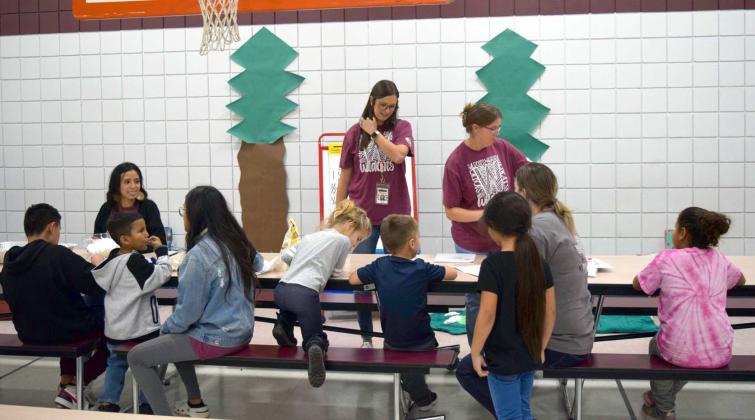 LITTLEFIELD PRIMARY BOOK FAIR -- Attendees of Camp Read-A-Lot enjoy making their own s’mores treat during Camp Read-A-Lot Family Reading event at Littlefield Primary on November 10, 2022. (Photo by Ann Reagan)