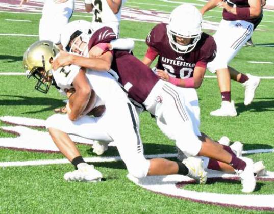 GETTING TO THE BALL – Littlefield’s Jerrius Ybarra chases down the Post ball carrier for a short gain, during their, 36-18, victory over Post at Wildcat Stadium on Thursday. (Staff Photo by Derek Lopez)