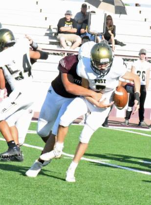 FORCING THE FUMBLE – Littlefield defensive lineman, Micah Keeney, gets to the quarterback and strips the ball, but the Antelopes were able to recover it for a loss, during their, 36-18, victory over Post at Wildcat Stadium on Thursday. (Staff Photo by Derek Lopez)