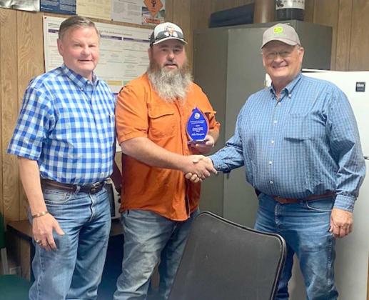 2022 CONSERVATION FARMER OF THE YEAR -- Larry Hobratschk (right) of The Lamb County Soil and Water Conservation District and Jack Foote (left), Field Representative for Area One, presented Mike Thompson with the 2022 Lamb County Conservation Farmer of the year award. Mike started farming in 2017 incorporating Soil Health principles into his farming operation. Mike is a fifth generation farmer. Four of the generations have farmed in Lamb County. (Submitted Photo)