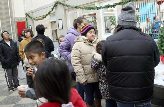 The Lamb County Library served hot cocoa and cookies at their Parade of Lights Open House following the Parade of Lights in downtown Littlefield on Friday, December 15, 2023. (Photo by Ann Reagan)