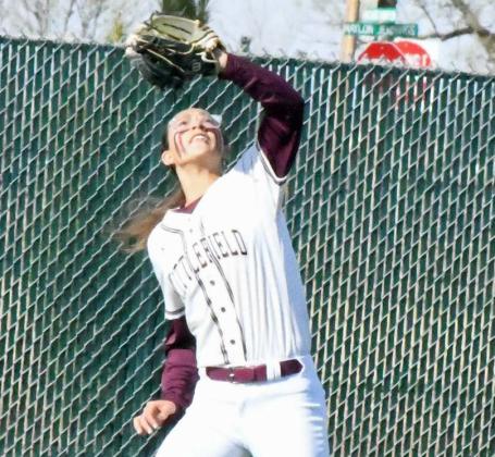 GETTING UNDER THE BALL - Littlefield right fielder, Myli Hernandez catches a fly ball for an out in the top of the first inning of the Lady Cats, 7-6, walk-off victory over Brownfield at Lady Cat Field on Tuesday. (Staff Photo by Derek Lopez)