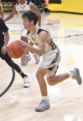 HORNETS FALL TO WHIRLWINDS IN SEASON-OPENER, 60-52