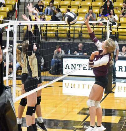 GOING FOR A KILL - Littlefield JV1’s Lindsay Coffman jumps up to try and deliver a kill through the Post blockers last Tuesday, as they swept the Lady Lopes, 2-0. (Staff Photo by Derek Lopez)