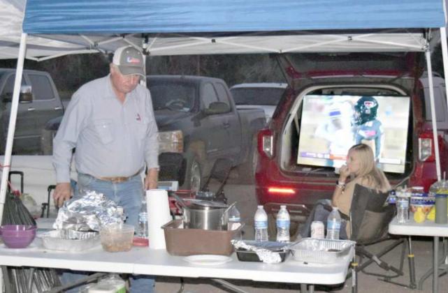GUESTS of the Texas Producers Tailgate Party could keep up with the Texas Tech football game via a television set provided for the producers.