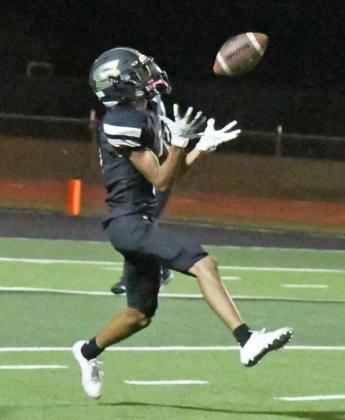 BEATING THE DEFENSE – Sudan senior wide receiver, Michael Limon, gets behind the defense as he catches a pass from Trent Wilson and takes it to the house for the touchdown, during the third quarter of Fridays loss to the Olton Mustangs in Sudan. (Staff Photo by Derek Lopez)