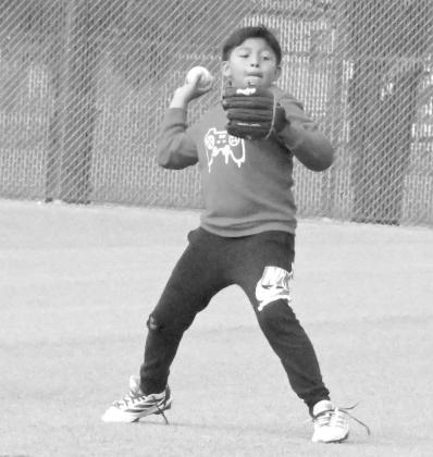 Campers worked on fielding and throwing skills at the Littlefield Baseball Camp that was held in June at Wildcat Field. (Staff Photo by Derek Lopez)