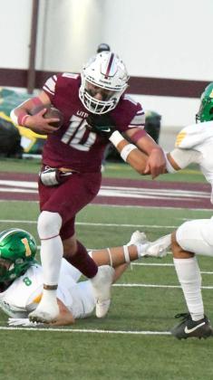 Littlefield senior, Ian Mendez (10), slips by a would-be tackler, during a kick-off return in the first half of the Wildcats loss on Friday to Idalou. (Staff Photo by Derek Lopez)