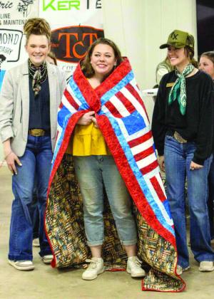 Two 4-H Veteran parents receive Quilts of Valor at Littlefield Area Stockshow