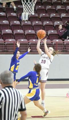 Littlefield’s Kennadi Hanlin (20) puts up a runner from the right elbow, during the first half of the Lady Cats’ Wildcat Classic victory over Hale Center last Thursday. (Staff Photo by Derek Lopez)