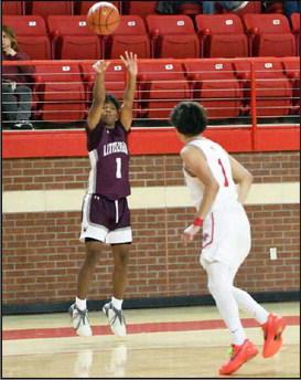 Littlefield senior guard, MJ Randle (1), fires up a three from the right wing, during the second half of the Wildcats, 77-26, district victory over the Denver City Mustangs on the road on Friday. (Staff Photo by Derek Lopez)