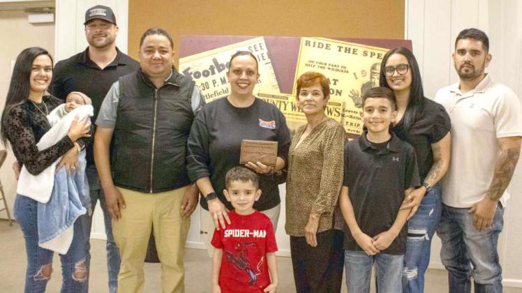 Business of the Year winners, Diana and Hector Espindola of Loco's, pose with their award alongside Leslie Lamberson, Arlian Torres, Jeremi McBride, Alex Torres Jr., Patricia Martínez, Axel Torres, Tanya Torres and Alex Torres on April 24, 2025. (Photo by Madison Vidales)