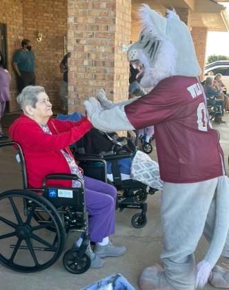 Arbor Grace resident, Marie Lee and the Wildcat mascot. (Submitted Photo)