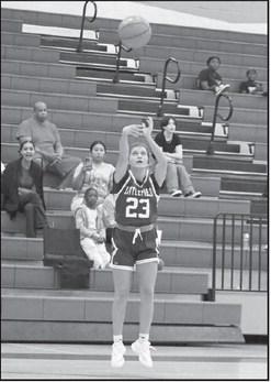 Littlefield’s Cobi Saldana drains a three from the right elbow, during the second half of the Lady Cat’s, 47-40, victory over the Estacado Lady Matadors last weekend in their season-opener. (Staff Photo by Derek Lopez)