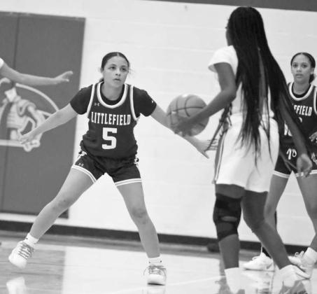 Littlefield’s Madison Williams (5) locks in on defense, as the guards the Estacado ball-handler, during the first half of the Lady Cats’ season-opening victory over the Lady Matadors last Saturday. (Staff Photo by Derek Lopez)