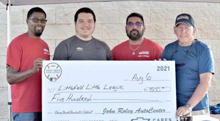 John Roley’s AutoCener makes donation