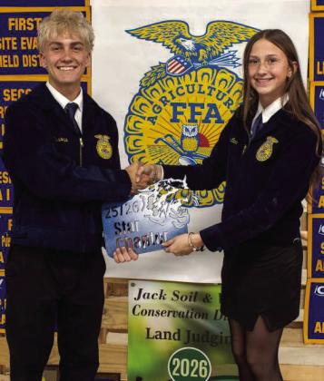 Payton Bussanmas presents Piper Carr with the Star Chapter Award at the Littlefield FFA banquet on May 18, 2026. (Photo by Madison Vidales)