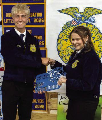 Payton Bussanmas presents Brenna Lowe with a Star Greenhand award at the Littlefield FFA banquet on May 18, 2026. (Photo by Madison Vidales)