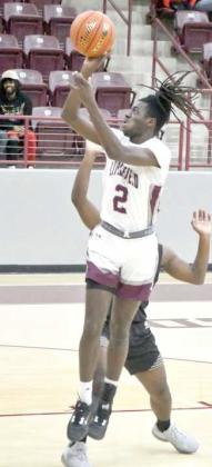Ja’Den Williams puts up a floater in the lane, during the Wildcats’ tournament-opener at the Wildcat Classic Wednesday evening. (Staff Photo by Derek Lopez)