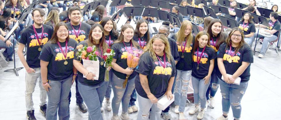 LITTLEFIELD ISD band students performed their last public concert for the 2022-23 school year on May 9, 2023 at the Wildcat Gym. Each year the band program highlights bands from first year band students to Junior High School band to the High School Wildcat Band. Above Band Director, Bonnie Anderson is pictured with this year’s graduating seniors in the Wildcat Band. (Photo by Ann Reagan)