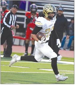 Sudan’s Kyler Edwards (23), breaks loose on a big run up the middle, during the first half of the Hornets road victory over the Eagles last Friday in Seagraves. (Staff Photo by Derek Lopez)