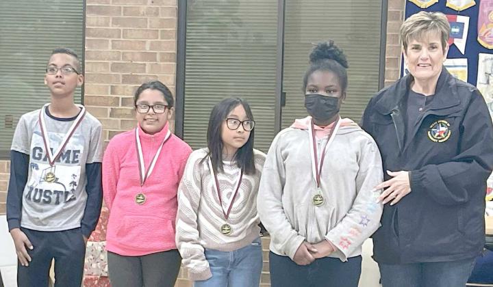 ROTARY REASONERS - The Rotary Reasoner winners from Littlefield Elementary School for the third six weeks are shown with Rotary President Kay King. (L-R): Lance Lewis, Priscilla Rodriguez, Kenya Reyes Solorio and Jayla Fair. (Submitted Photo)