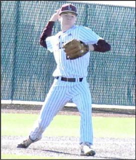MAKING THE PLAY - Littlefield third baseman, Chip Green, fields a ball at third base and fires it across the diamond to first for the out, during the Wildcats’, 8-3, loss to Lubbock Christian on Friday morning in game one of their double-header. (Staff Photo by Derek Lopez)