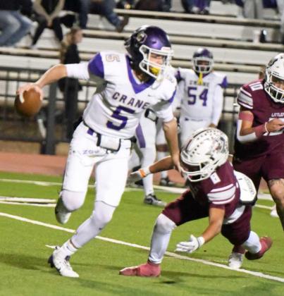 Littlefield junior linebacker, Ben Castillo, gets into the backfield, as he chases down Crane quarterback, Tyson Brents for a sack, during the first half of their 3A Area Championship victory over Crane in Lamesa on Friday. (Staff Photo by Derek Lopez)