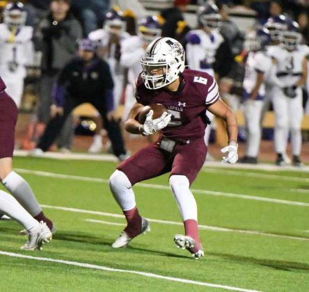 Littlefield running back, Blayton Solis, runs the ball, during the fourth quarter of their, 59-0, shutout over Crante in the Class 3AArea Championship in Lamesa on Friday. (Staff Photo by Derek Lopez)
