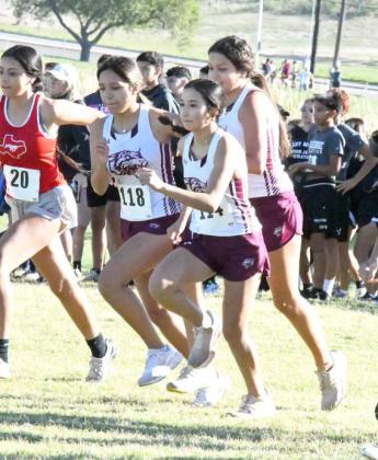 DISTRICT MEET - The Littlefield Lady Cat’s varsity cross country team competes at the District 3-3A Meet on Tuesday at Mae Simmons Park in Lubbock. Junior, Brinley Acevedo, led the team finishing 20th overall. Also shown are Arianna Castillo and Jazmine Rosales. (Staff Photo by Derek Lopez)