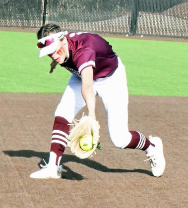 Littlefield sophomore, Bryndle Ray, backhands a ball deep in the hole at shortstop keeping the ball on the infield and holding the runner to a single, during the Lady Cats’, 11-8, road loss to Lamesa on Tuesday. (Staff Photo by Derek Lopez)