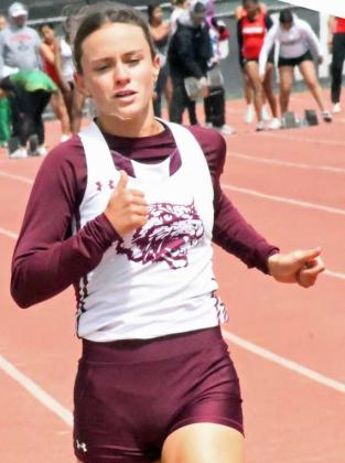 Littlefield’s Bryndle Ray, competes in the women’s 100-meter dash at the District Track meet at Lubbock-Cooper on Thursday. (Staff Photo by Derek Lopez)