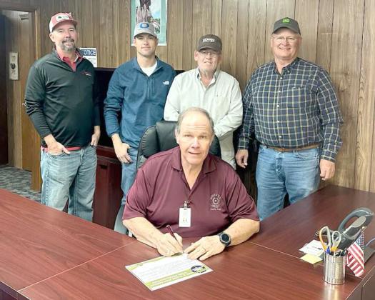 Lamb County Judge Mike DeLoach signs Stewardship Proclamation, making April 28th through May 5, Soil and Water Stewardship Week. Shown L-R): Lamb County SWCD Board Members: Jeff Edwards, Tracy DeBerry, Roy Thompson, Larry Hobratschk, Judge Mike DeLoach. (Not Pictured): Jason Spangler. (Submitted Photo)