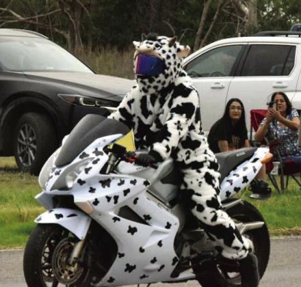 Motorcyclists and ATVs ride through the Springlake Fourth of July parade, which began at 6 p.m. as part of a fundraiser for the Springlake Volunteer Fire Department. (Photo by Leon Szaniszlo)