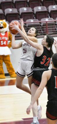 Littlefield senior, Ari Castillo, drives in for a lay-up, during the first half of the Lady Cats, 39-23, home victory over Slaton on Tuesday at Wildcat Gym. (Staff Photo by Derek Lopez)