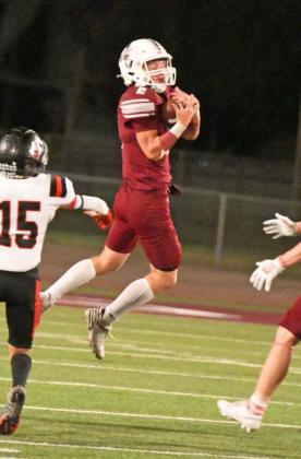 Littlefield senior safety, Major McNeese, picks off Slaton quarterback, Jacob Lopez, with 2:52 remaining in the fourth quarter of Friday’s, 55-36, victory over the Tigers to open district 2-3A play at Wildcat Stadium. (Staff Photo by Derek Lopez)