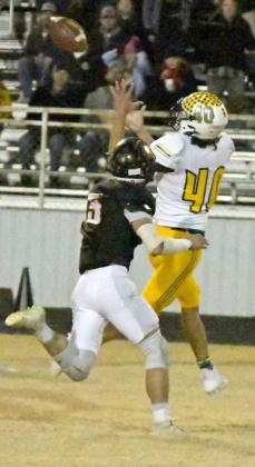 CATCH AND RUN – Springlake-Earth junior, Dereck Rosalez (40), makes a big catch and is able to break away from the defender for extra yards before being brought down, during the Wolverines Bidistrict loss to Happy on Thursday at Anton. (Staff Photo by Derek Lopez)