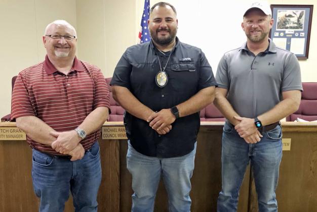 Sammy Garcia was appointed to the position of Chief of Littlefield Police Department, during a City Council Meeting Tuesday. (Shown L-R): City Manager Mitch Grant, LPD Chief Sammy Garcia and Mayor Eric Turpen. (Staff Photo by Derek Lopez)