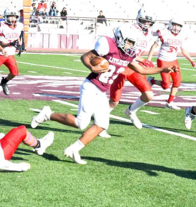 LITTLEFIELD 7TH GRADE WILDCATS - Littlefield seventh grade Wildcats running back, Brandon Espinoza carries the ball, breaking a tackle as he sprints down the sideline for a huge gain, during their district-opening loss at home to Coahoma. (Staff Photo by Derek Lopez)