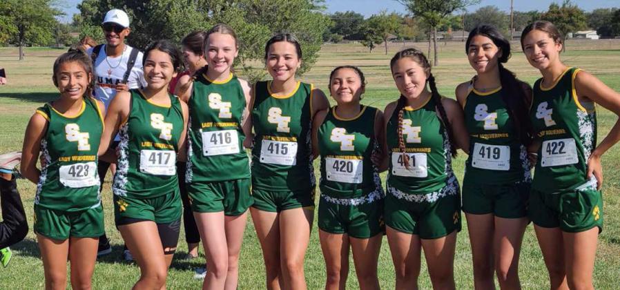 COMPETING HARD - The Lady Wolverines’ varsity cross country team placed sixth in the Women’s two-mile race of 1A-4A Schools with 157 points at the Amarillo College Badger Run. (Shown): Aabriella Villanueva, Jasmine Garcia, Riley Furr, Jenna Bridges, Aryca Ibarra, Jessica Mendoza, Marisela Rodriguez and Emma Samaron. (Submitted Photo)