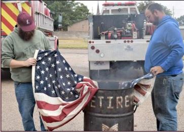 Anthony Thomas conducts flag retirement in Anton